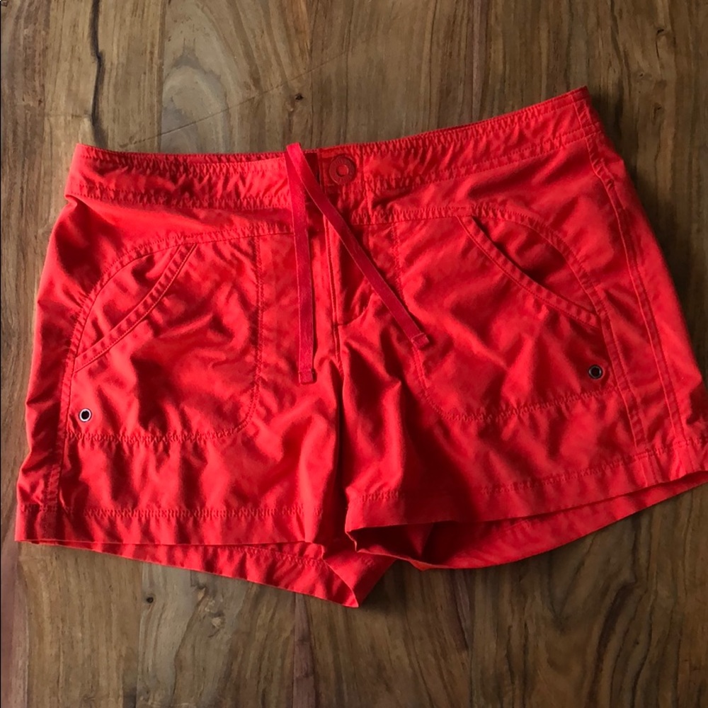 Athleta red swim shorts